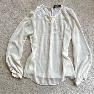Cream blouse with lace shoulder detail